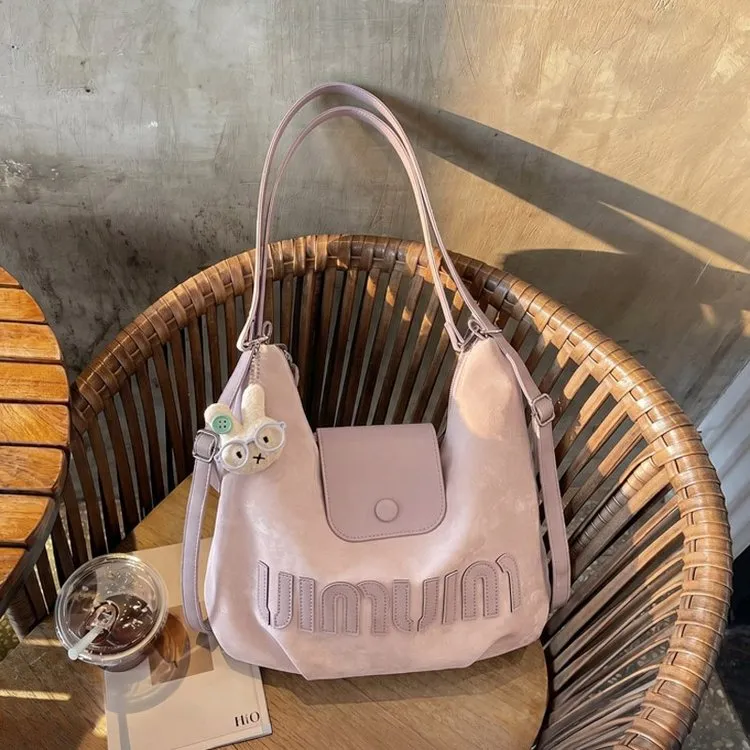 Tas Ransel Wanita Bahan PU Sintetis Resleting Dengan Gantungan Grosir Import