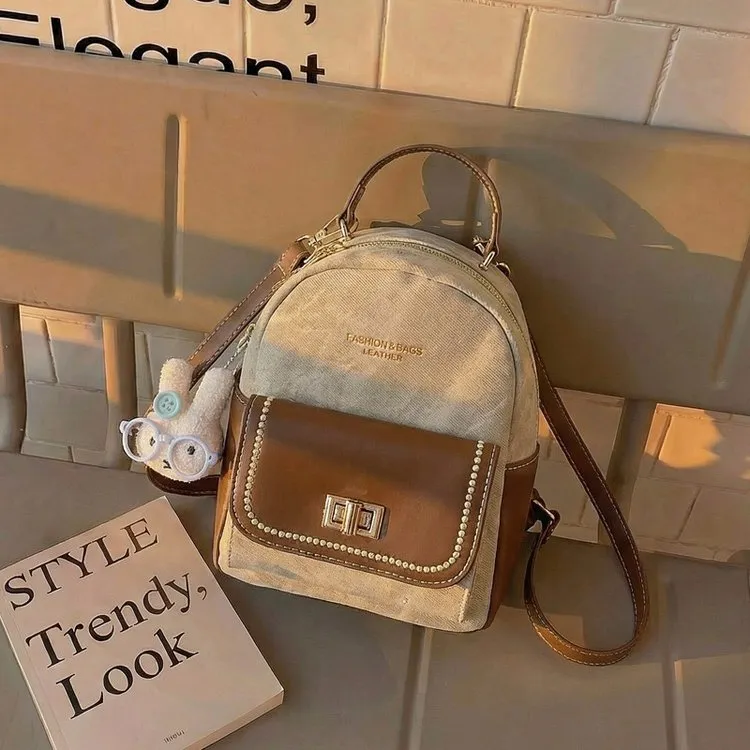 Tas Ransel Wanita Bahan PU Sintetis Resleting Dengan Gantungan Grosir Import