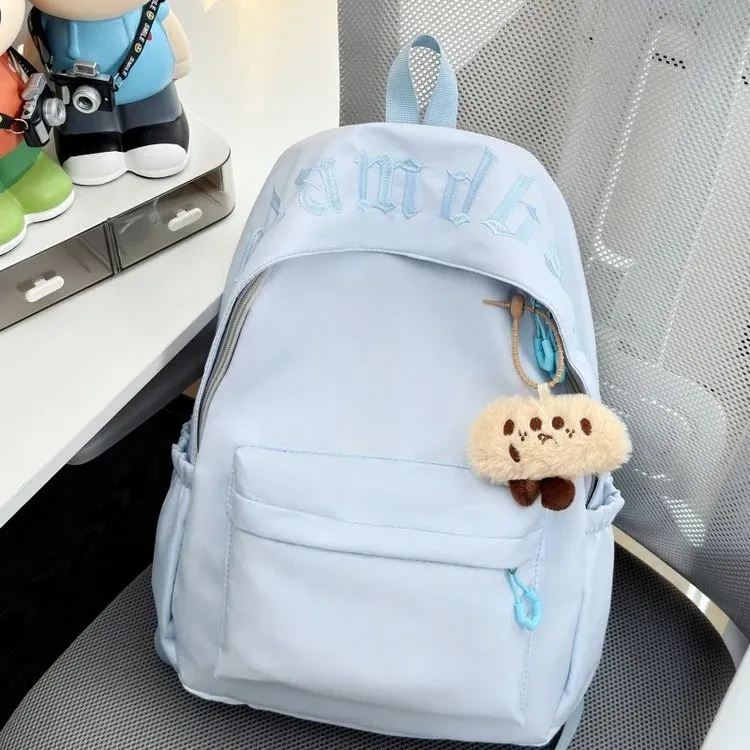Tas Ransel Wanita Bahan Nylon Motif Print Warna Putih Bentuk Kotak Tali Lebar Bahan Polyester