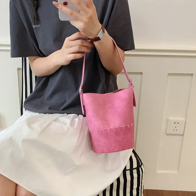 Tas Bucket Wanita Bahan PU Sintetis Polos Warna Pink Bentuk Bucket Tali Panjang Grosir Import