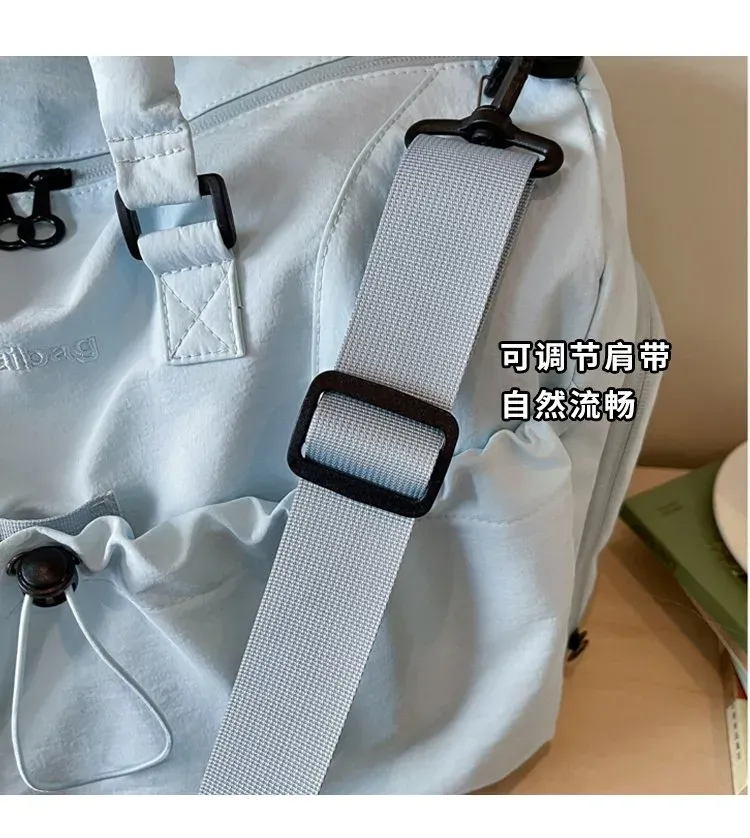 Tas Selempang Wanita Bahan Nylon Polos Warna Biru Bentuk Kotak Tali Panjang untuk Travel