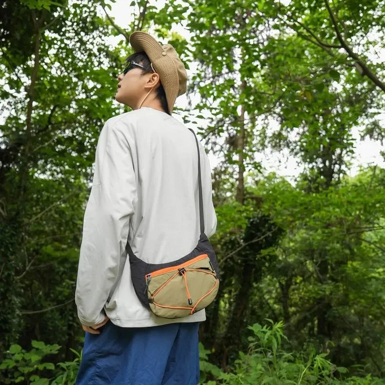 Tas Selempang Wanita Bahan Nylon Polos Warna Hijau Bentuk Bulat Tali Panjang Grosir Import