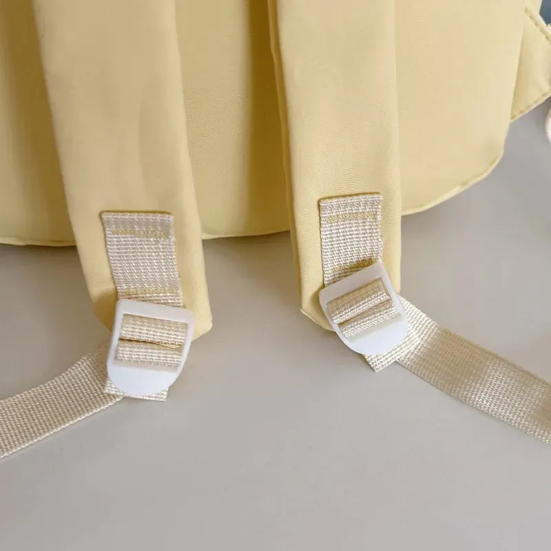 Tas Ransel Wanita Bahan Oxford Polos Warna Kuning Bentuk Kotak Tali Lebar untuk Travel Grosir