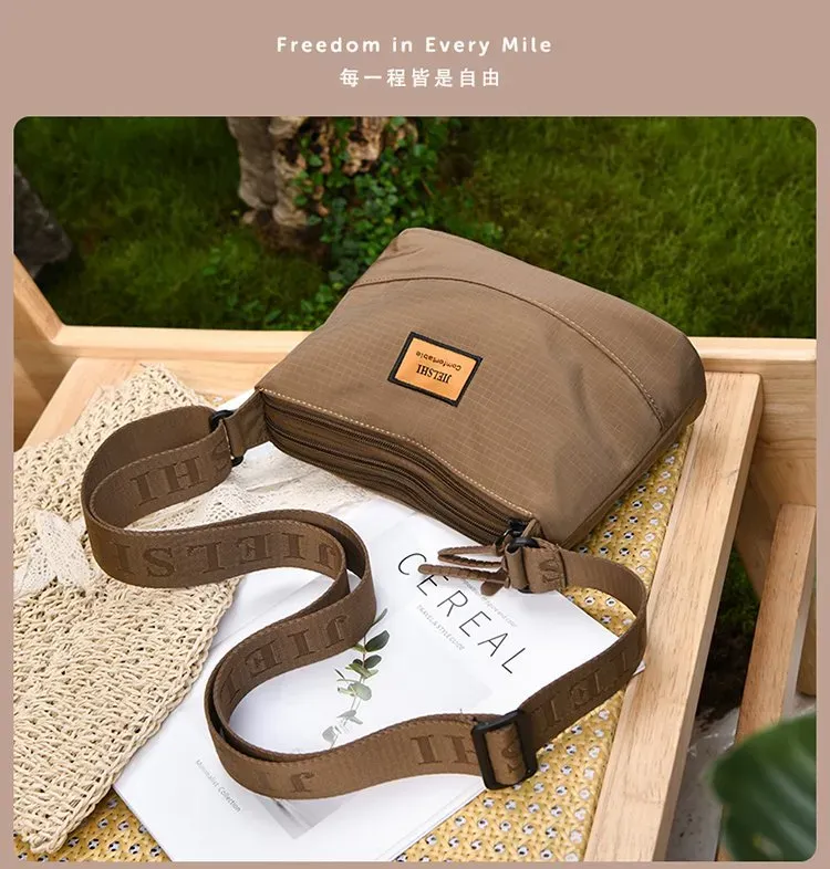 Tas Selempang Wanita Bahan Nylon Polos Warna Cokelat Bentuk Kotak Tali Panjang Grosir Import