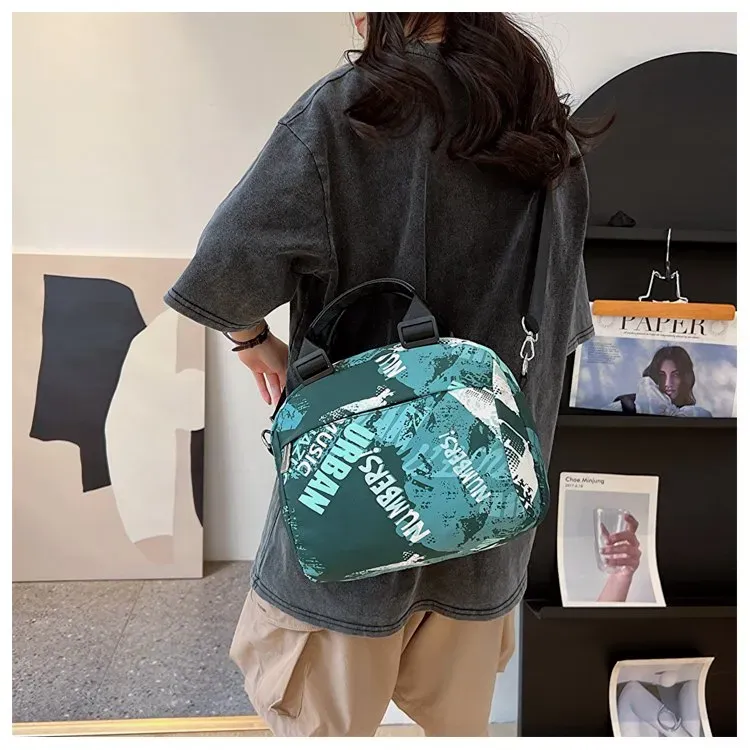 Tas Selempang Wanita Bahan PU Sintetis Motif Print Warna Hitam Bentuk Bulat Tali Grosir Import