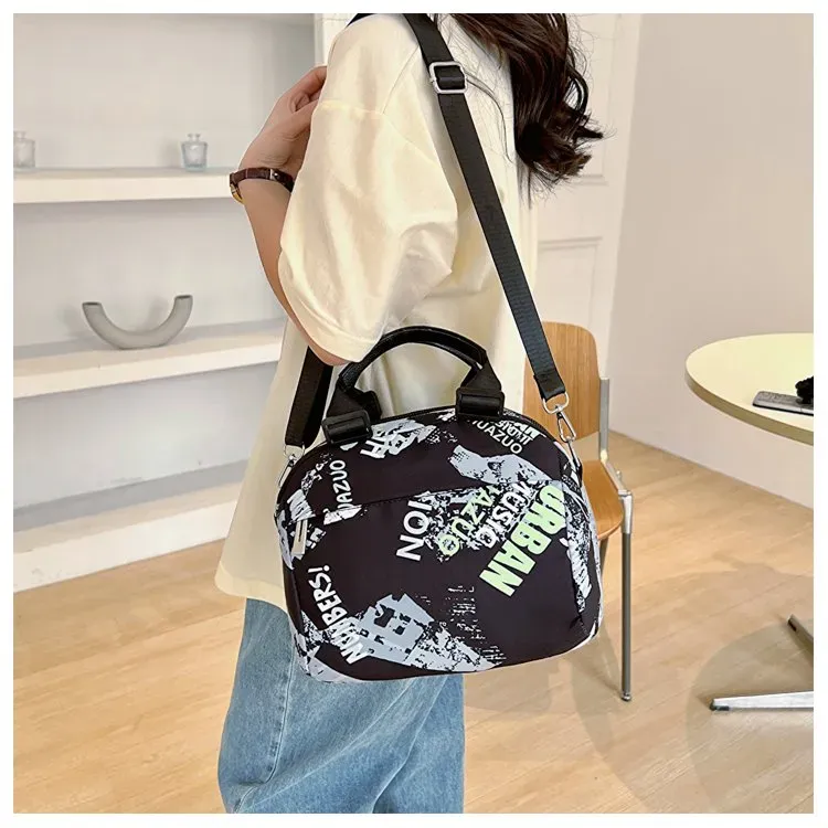 Tas Selempang Wanita Bahan PU Sintetis Motif Print Warna Hitam Bentuk Bulat Tali Grosir Import