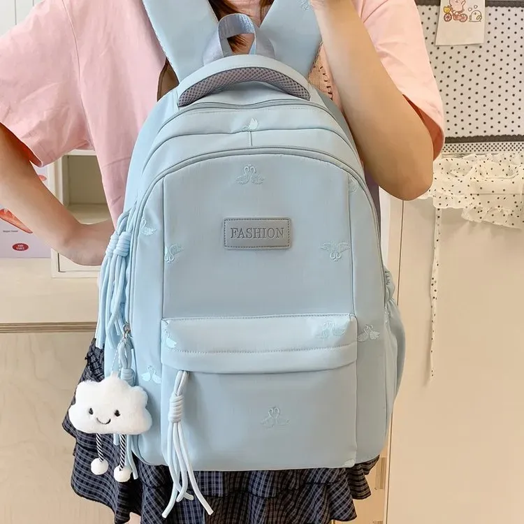 Tas Ransel Wanita Bahan Nylon Motif Print Warna Putih Bentuk Kotak Tali Lebar Grosir Import