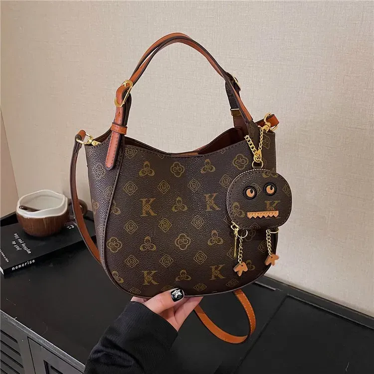 Tas Bucket Wanita Bahan PU Sintetis Motif Print Bentuk Bucket Tali Panjang Grosir Import