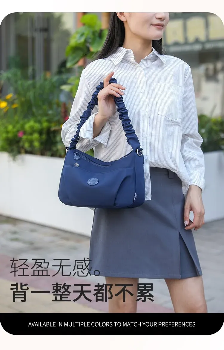 Tas Selempang Wanita Bahan Nylon Polos Warna Merah Model Hobo Tali Serut Grosir Import