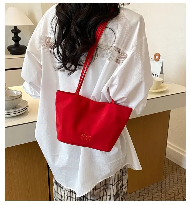 Tas Selempang Wanita Bahan Nylon Polos Warna Hitam Bentuk Kotak Tali Serut Casual Grosir Import