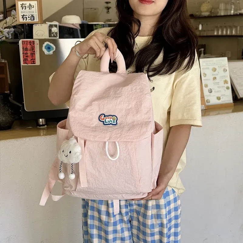 Tas Ransel Wanita Bahan Nylon Polos Warna Pink Bentuk Kotak Tali Panjang Grosir Import kategori tas ransel grosir