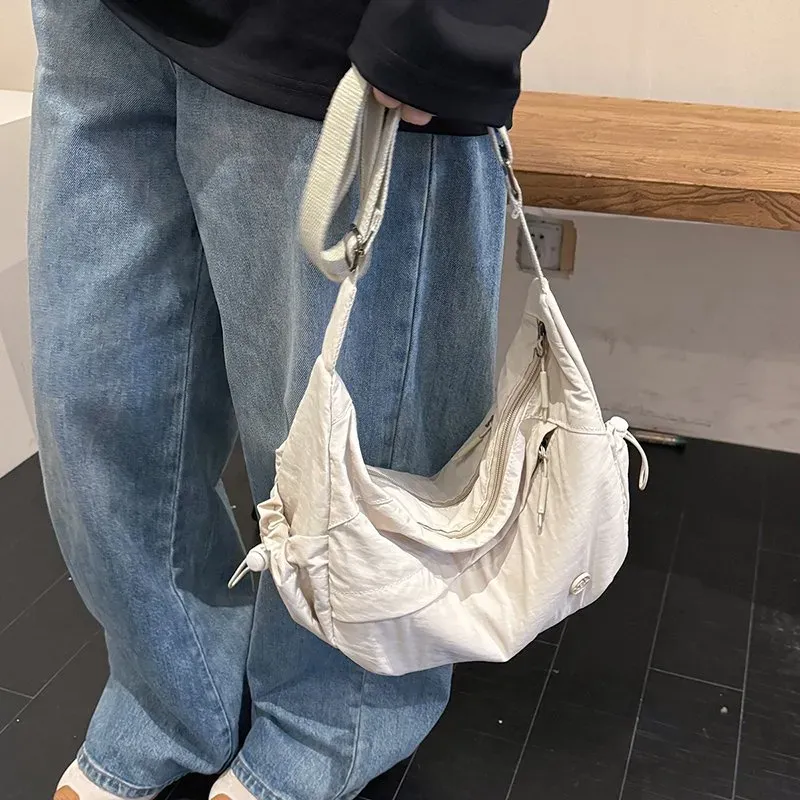 Tas Selempang Wanita Bahan PU Sintetis Polos Model Hobo Tali Serut Model Flap Grosir Import kategori tas selempang grosir