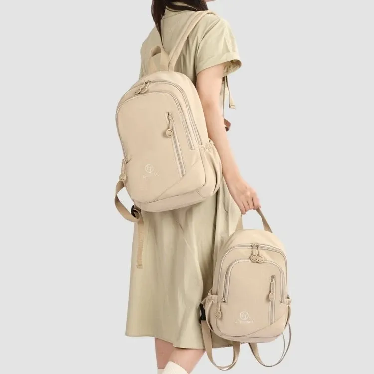 Tas Ransel Wanita Bahan Nylon Polos Bentuk Kotak Tali Lebar Kapasitas Besar Mini Grosir Import