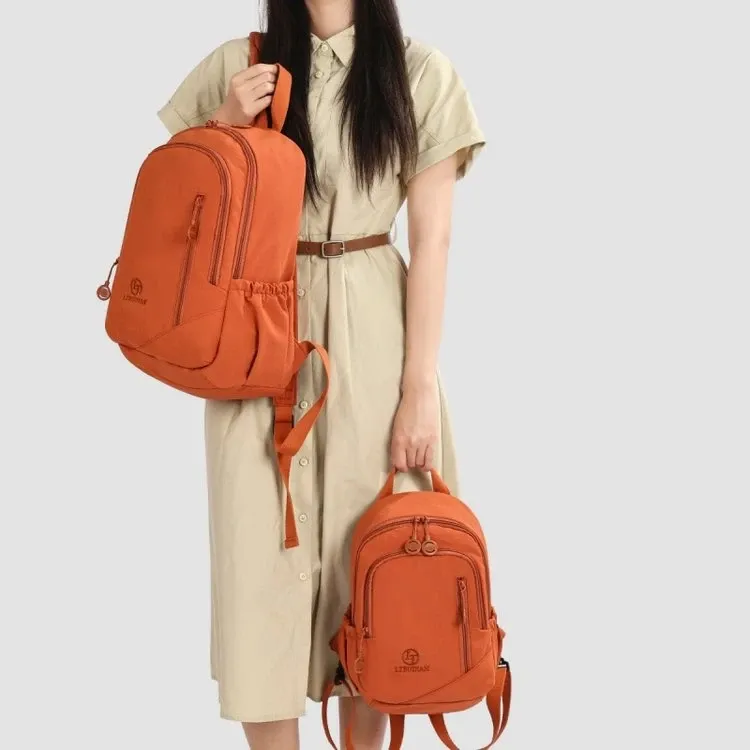 Tas Ransel Wanita Bahan Nylon Polos Bentuk Kotak Tali Lebar Kapasitas Besar Mini Grosir Import