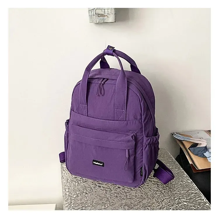 Tas Ransel Wanita Bahan Nylon Polos Warna Ungu Bentuk Kotak Tali Lebar Resleting untuk Jualan