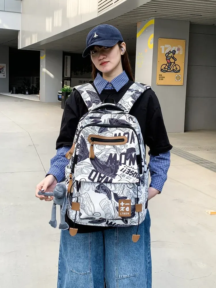 Tas Ransel Wanita Bahan PU Sintetis Motif Print Warna Hitam Bentuk Kotak Tali Dengan Gantungan