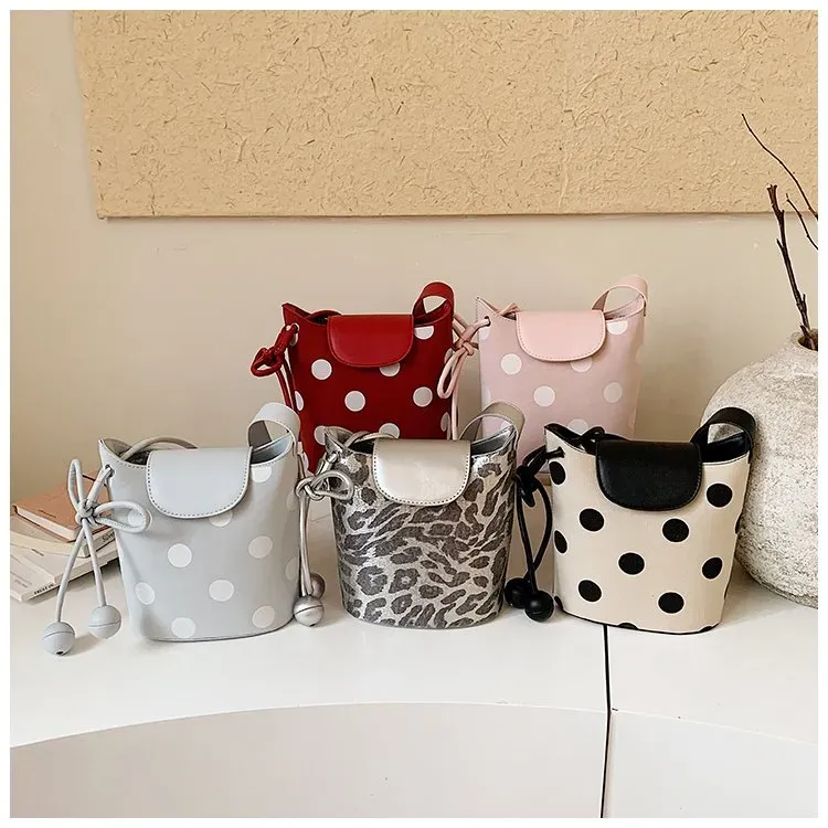 Tas Bucket Wanita Bahan PU Sintetis Motif Polkadot Warna Pink Bentuk Bucket Tali Grosir Import