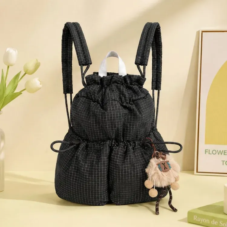 Tas Ransel Wanita Bahan Oxford Motif Grid Warna Hijau Bentuk Bulat Tali Serut Grosir Import