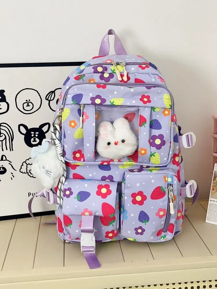 Tas Ransel Wanita Bahan Nylon Motif Print Warna Ungu Bentuk Kotak Tali Lebar Grosir Import