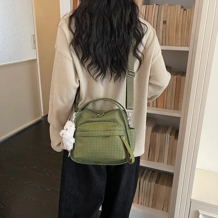 Tas Selempang Wanita Bahan Nylon Motif Grid Bentuk Kotak Tali Panjang Resleting Grosir Import