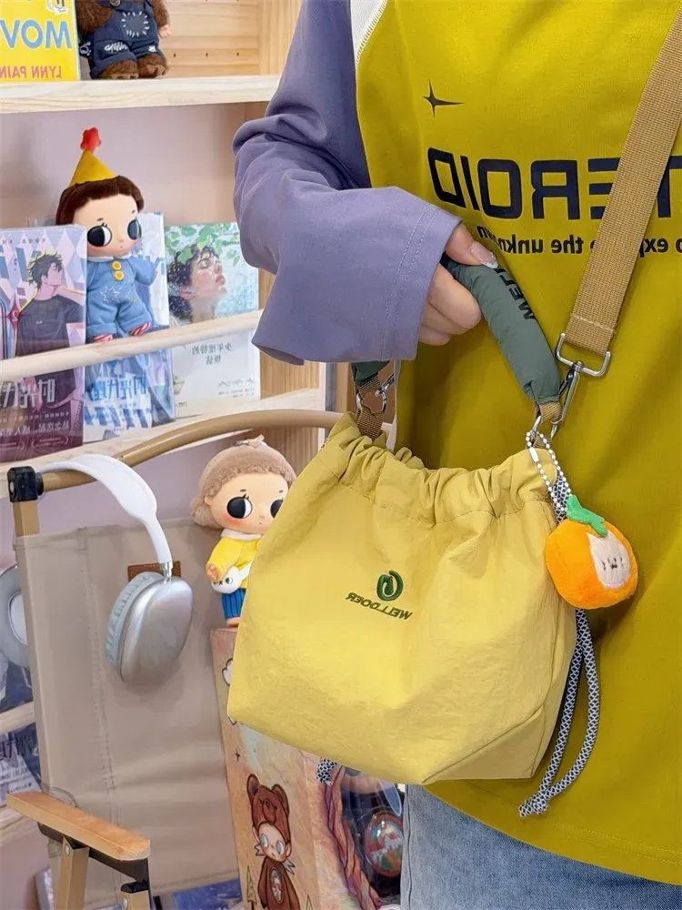 Tas Bucket Wanita Bahan Nylon Polos Warna Putih Bentuk Bucket Tali Panjang Grosir Import