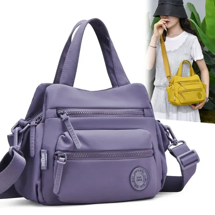 Tas Selempang Wanita Bahan Nylon Polos Warna Ungu Bentuk Kotak Tali Panjang Grosir Import