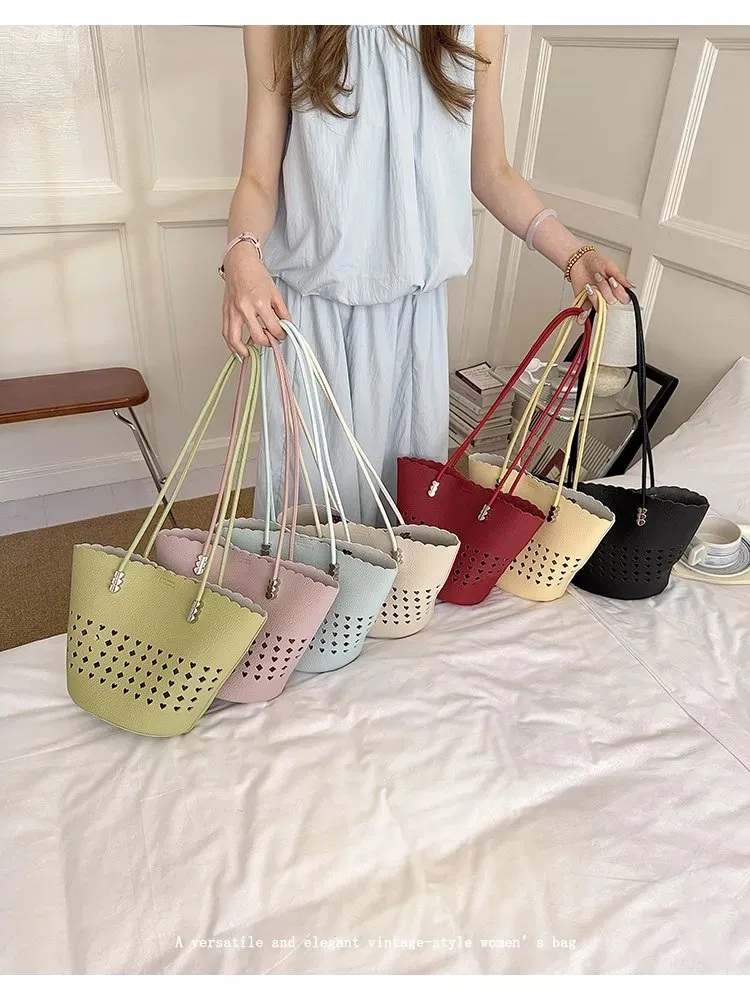 Tas Bucket Wanita Bahan PU Sintetis Motif Lubang Berbentuk Segitiga Warna Putih Grosir Import