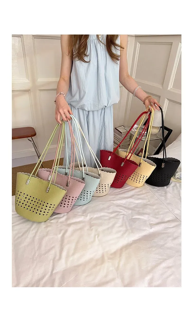 Tas Bucket Wanita Bahan PU Sintetis Motif Lubang Berbentuk Segitiga Warna Putih Grosir Import kategori tas selempang grosir