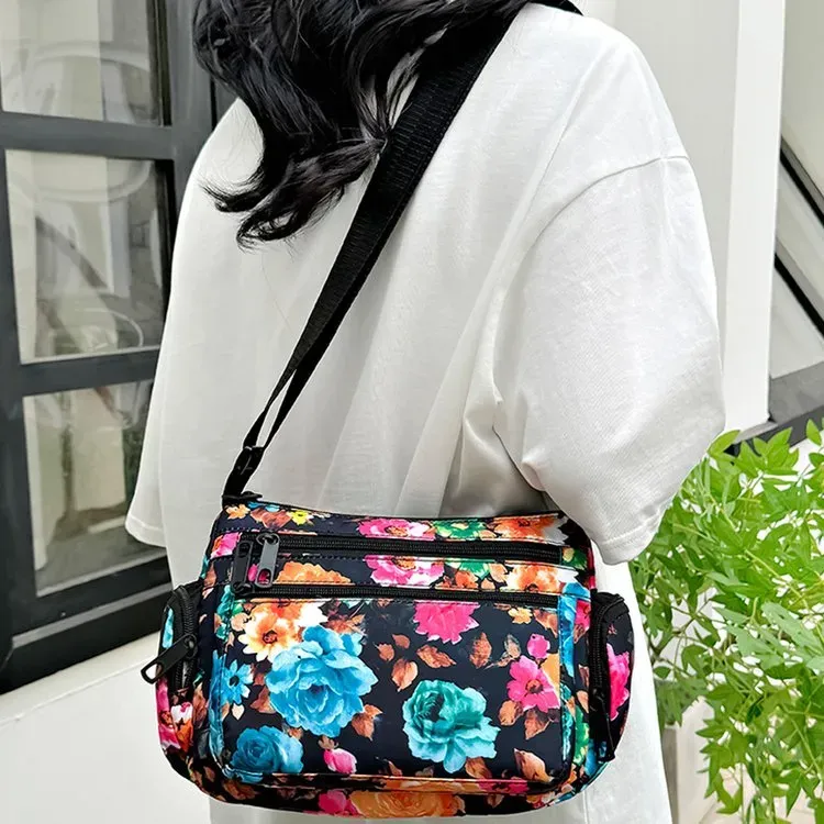 Tas Selempang Wanita Bahan Nylon Motif Floral Warna Hitam Bentuk Kotak Tali Grosir Import