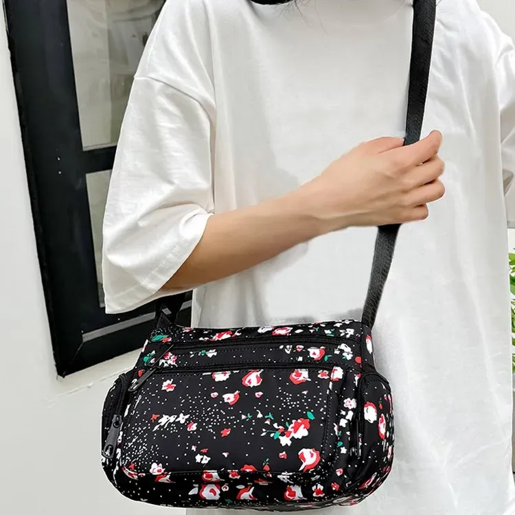 Tas Selempang Wanita Bahan Nylon Motif Floral Warna Hitam Bentuk Kotak Tali Grosir Import