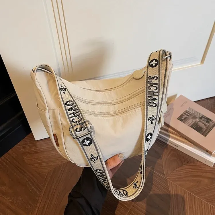 Tas Selempang Wanita Bahan Nylon Motif Print Bentuk Crescent Tali Lebar Resleting Grosir Import