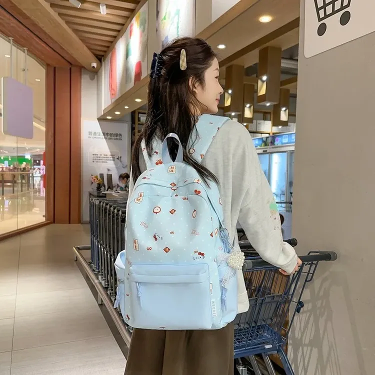 Tas Ransel Wanita Bahan Nylon Motif Print Warna Biru Bentuk Kotak Tali Lebar Motif Floral
