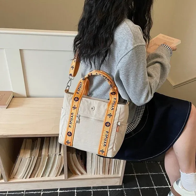 Tas Selempang Wanita Bahan Nylon Motif Print Warna Biru Bentuk Kotak Tali Lebar Grosir Import