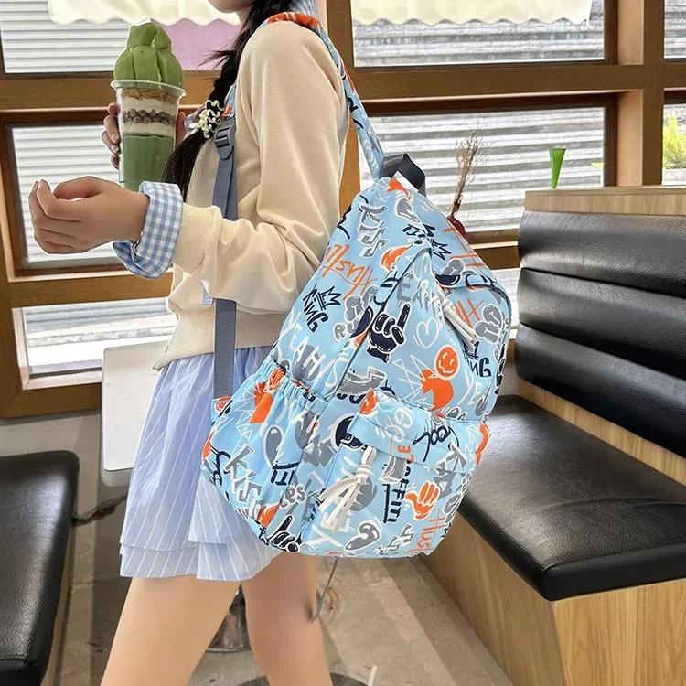 Tas Ransel Wanita Bahan Nylon Motif Floral Warna Hitam Resleting Grosir Import