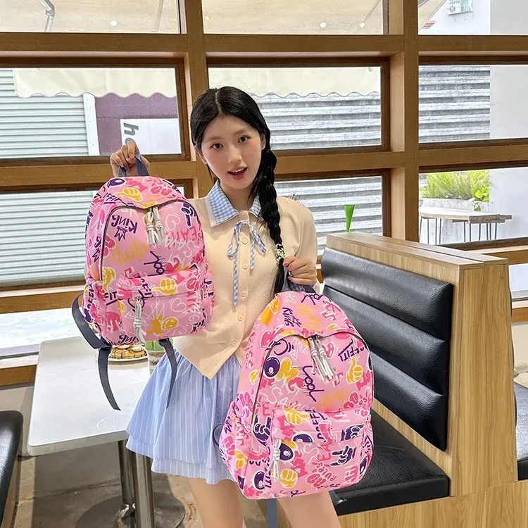 Tas Ransel Wanita Bahan Nylon Motif Floral Warna Hitam Resleting Grosir Import