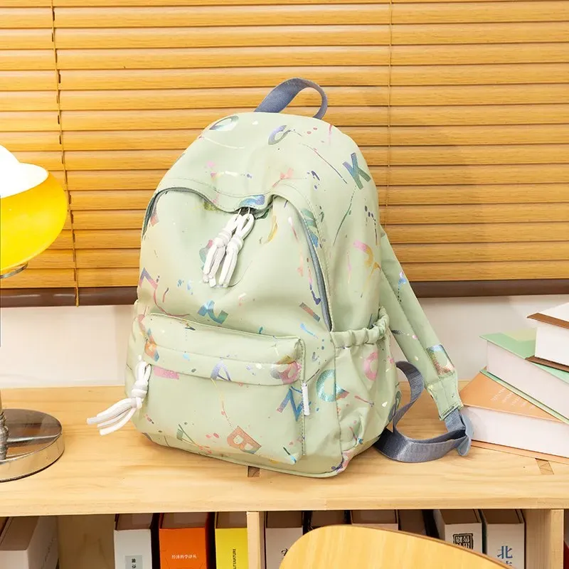 Tas Ransel Wanita Bahan Nylon Motif Print Bentuk Kotak Tali Lebar Resleting Katalog Grosir