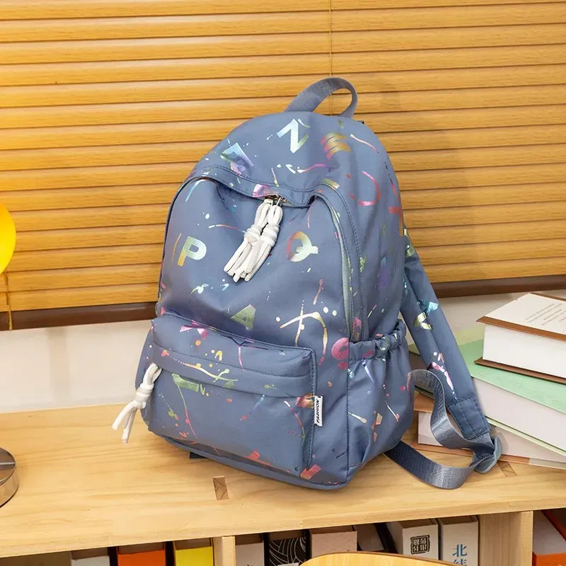 Tas Ransel Wanita Bahan Nylon Motif Print Bentuk Kotak Tali Lebar Resleting Katalog Grosir