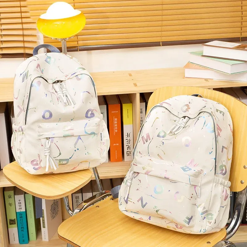 Tas Ransel Wanita Bahan Nylon Motif Print Bentuk Kotak Tali Lebar Resleting Katalog Grosir