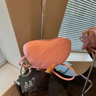 Tas Selempang Wanita Bahan PU Sintetis Polos Warna Pink Bentuk Bulat Tali Grosir Import