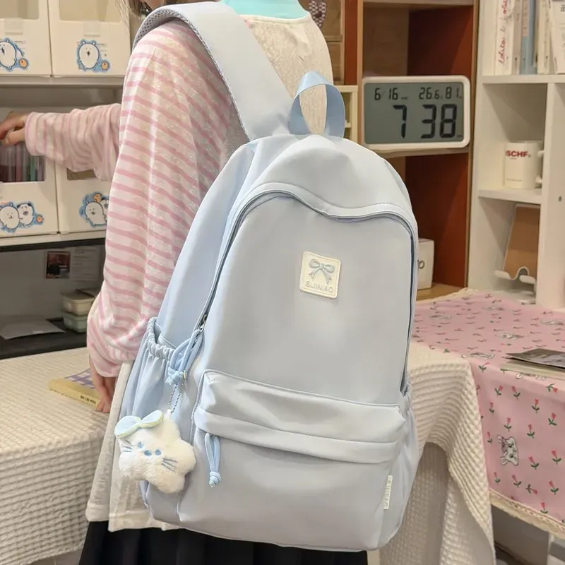 Tas Ransel Wanita Bahan Nylon Polos Warna Pink Bentuk Kotak Tali Lebar Resleting