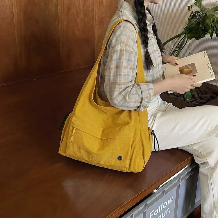 Tas Selempang Wanita Bahan Nylon Polos Warna Kuning Bentuk Kotak Tali Panjang Grosir Import