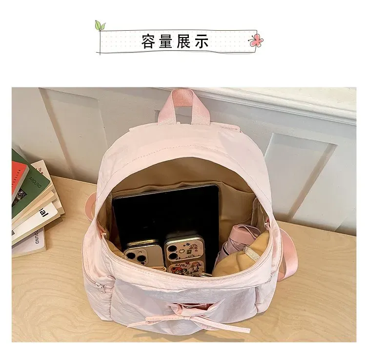 Tas Ransel Wanita Bahan Nylon Polos Warna Pink Bentuk Kotak Tali Lebar Resleting Motif Print