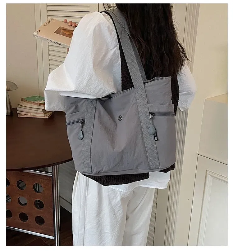 Tas Selempang Wanita Bahan Nylon Polos Warna Abu-Abu Bentuk Kotak Tali Lebar Grosir Import