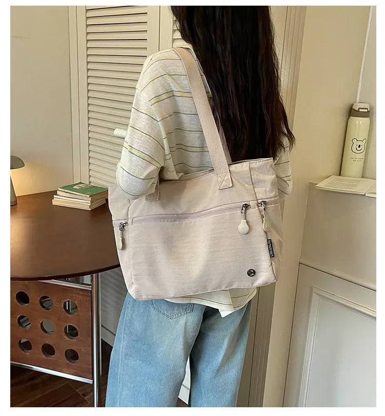 Tas Selempang Wanita Bahan Nylon Polos Bentuk Kotak Tali Lebar Resleting Koleksi Reseller