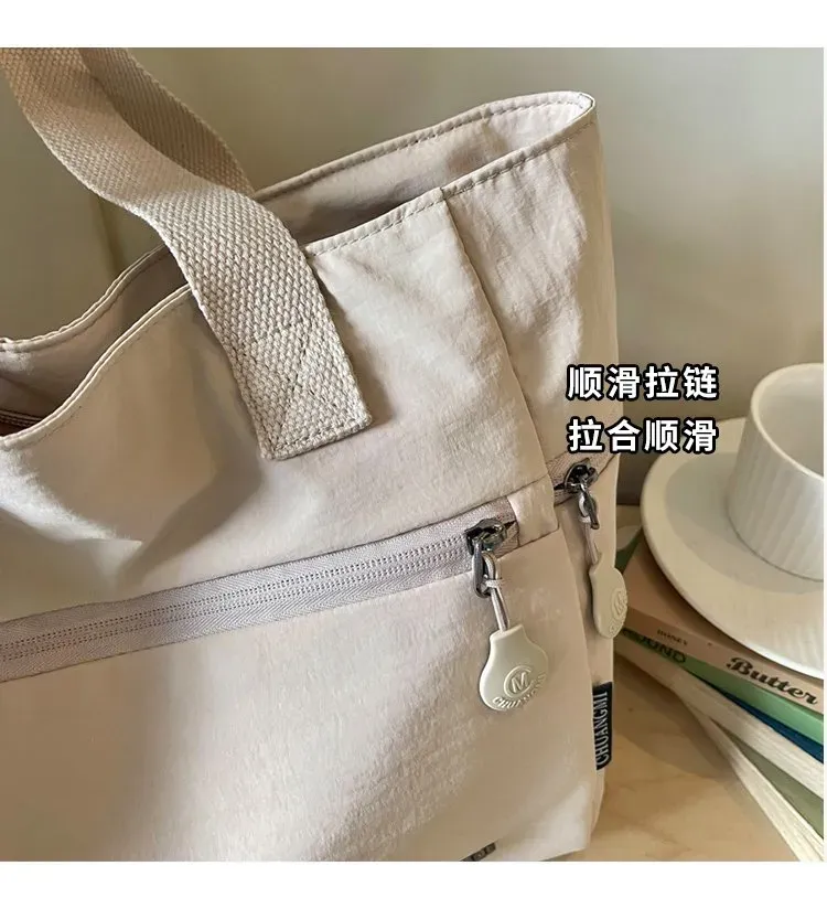 Tas Selempang Wanita Bahan Nylon Polos Bentuk Kotak Tali Lebar Resleting Koleksi Reseller