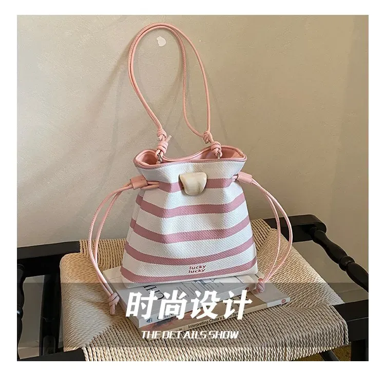 Tas Bucket Wanita Bahan PU Sintetis Motif Garis Warna Putih Bentuk Bucket Tali Grosir Import