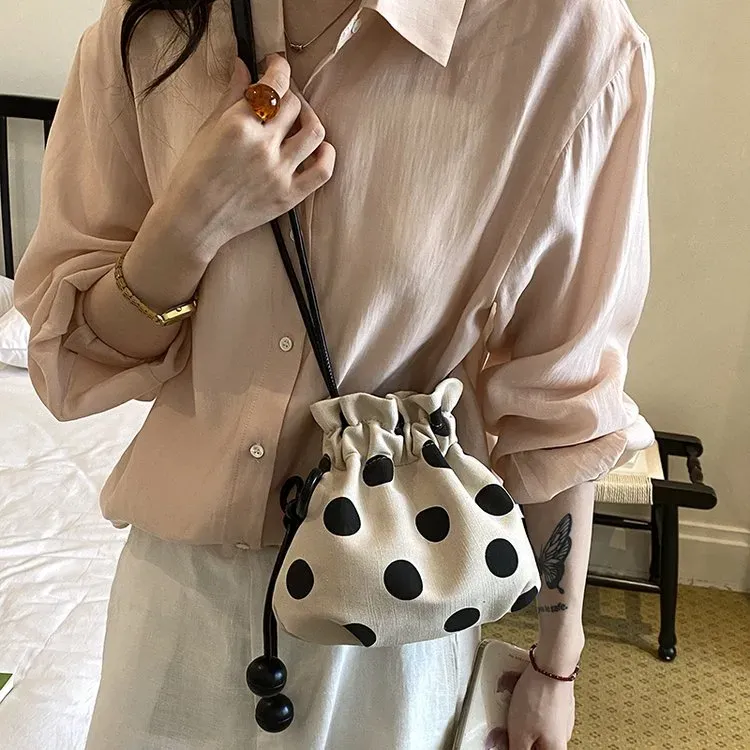 Tas Bucket Wanita Bahan PU Sintetis Motif Polkadot Warna Hitam Bentuk Bucket Grosir Import