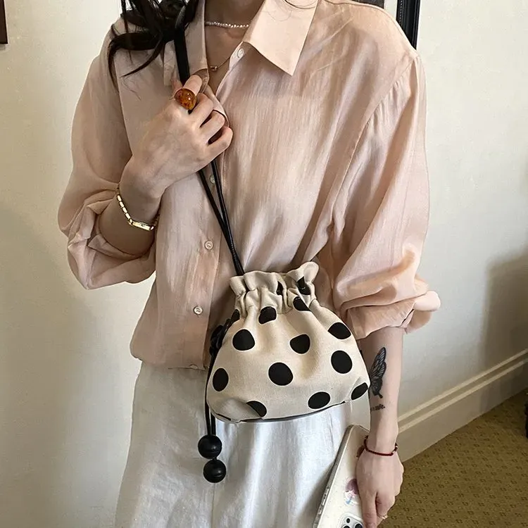 Tas Bucket Wanita Bahan PU Sintetis Motif Polkadot Warna Hitam Bentuk Bucket Grosir Import