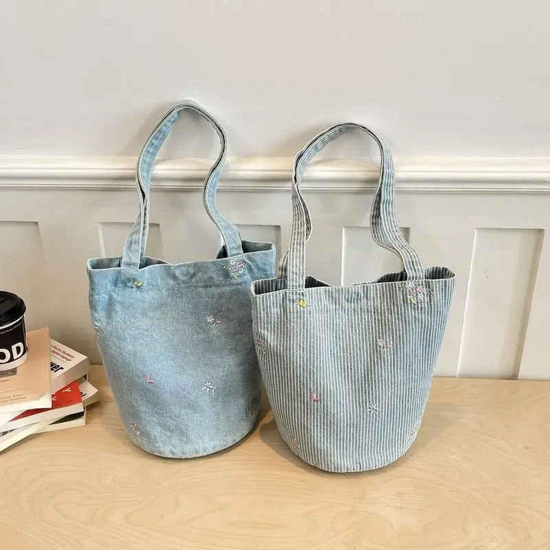 Tas Bucket Wanita Bahan PU Sintetis Polos Warna Biru Bentuk Bucket Tali Lebar Katalog Grosir kategori tas selempang grosir