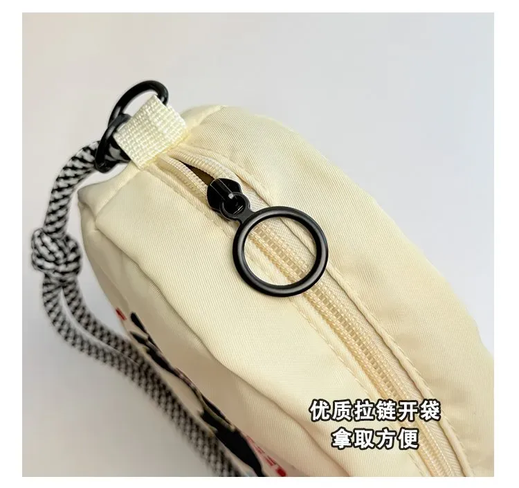 Tas Selempang Wanita Bahan Nylon Motif Print Warna Hitam Bentuk Bulat Tali Serut Grosir Import